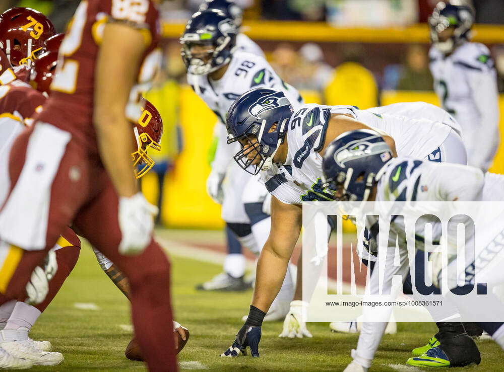 Seattle Seahawks defensive lineman Al Woods (99) celebrates after