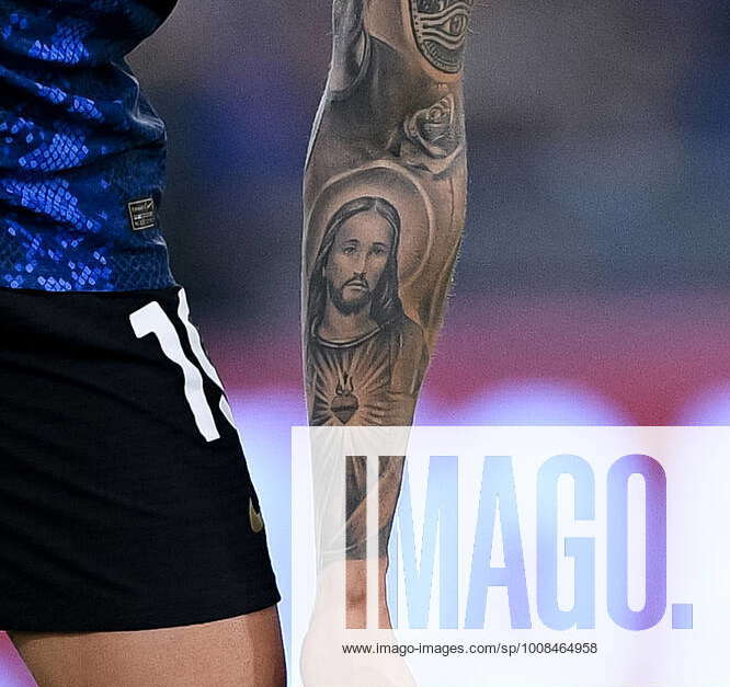 A detailed view of the tattooed left arm of Joaquin Correa of