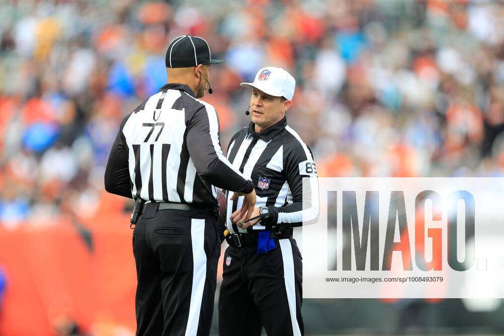 December 5, 2021: umpire Terry Killens (77) and referee Shawn