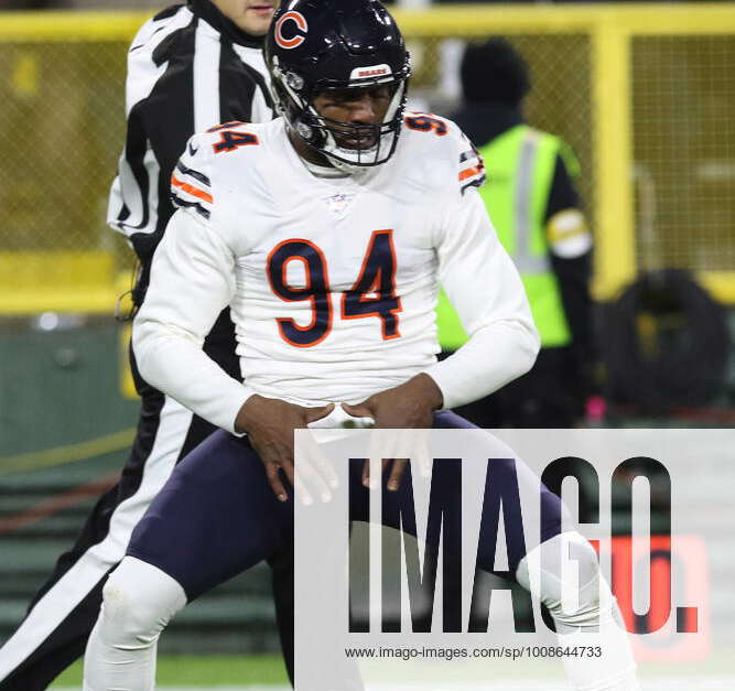 GREEN BAY, WI - SEPTEMBER 18: Chicago Bears linebacker Robert Quinn (94)  looks into the stands during a game between the Green Bay Packers and the Chicago  Bears on September 18, 2022