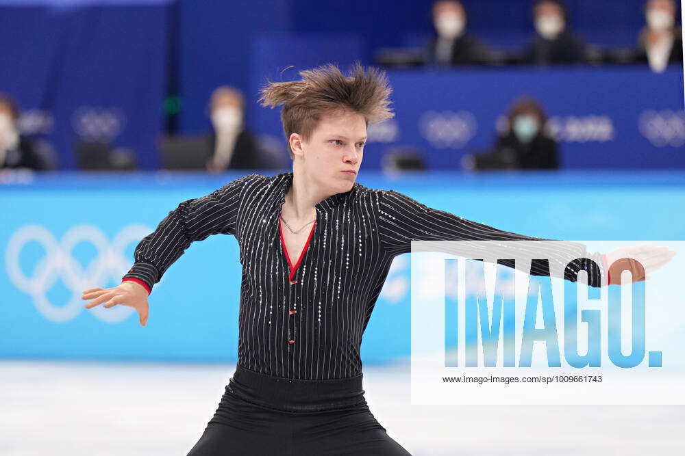 Evgeni Semenenko of Russia, performs during Men s Single Figure skating ...