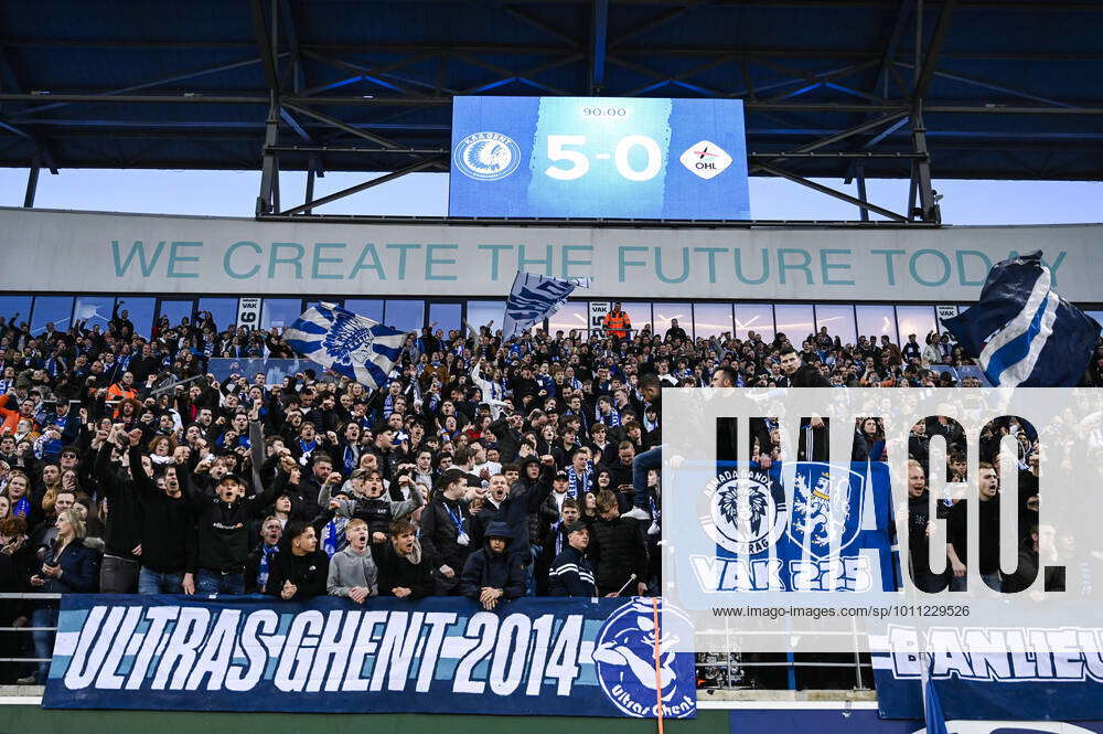 KAA Gent fans celebrate after winning during a soccer match between KAA
