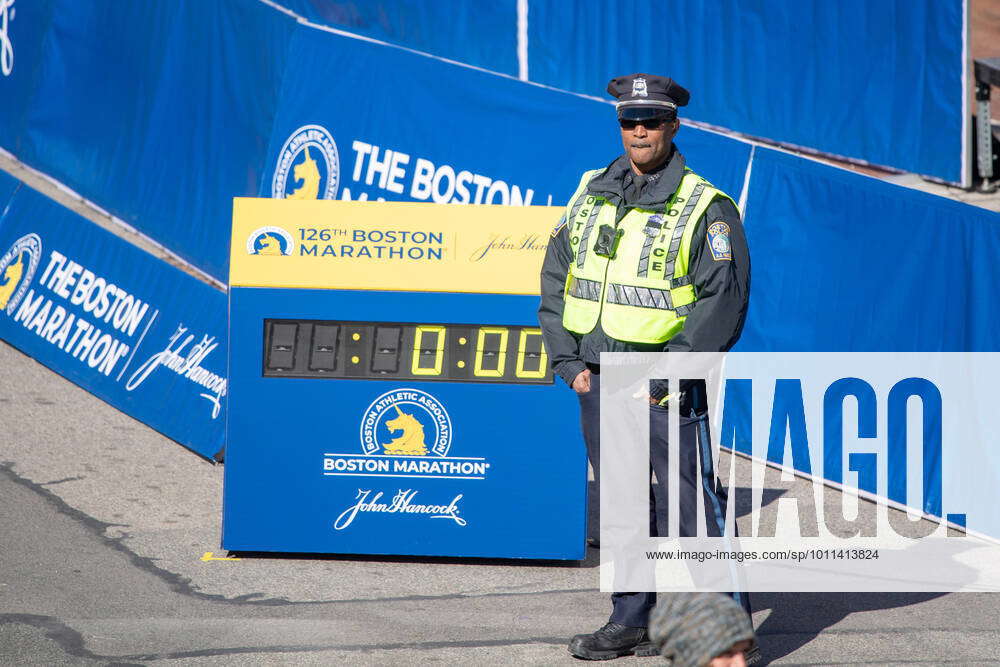 boston-ma-april-18-a-boston-police-department-officer-stands-guard