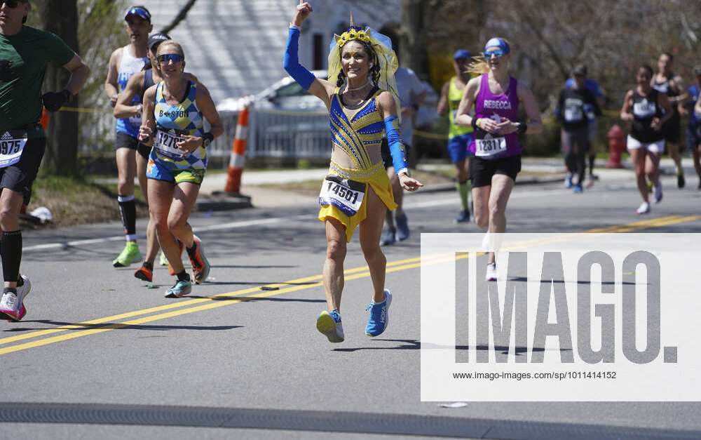 2022 Boston Marathon Yuki Chorney, wearing blue and yellow attire