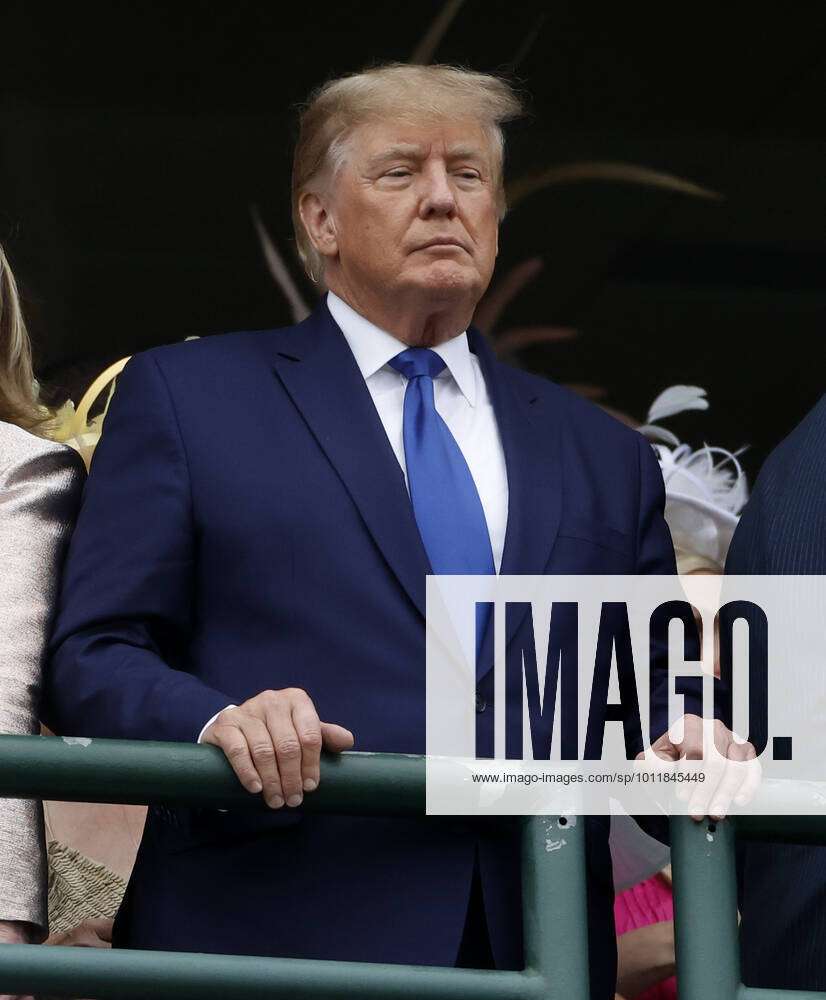 Former U.S. President Donald Trump (C) attends the 148th Running of the