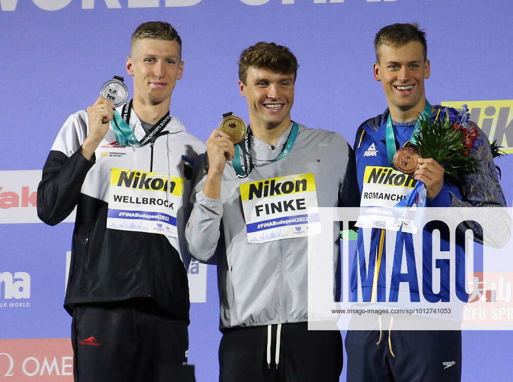 Florian Wellbrock of Germany ,Bobby Finke of USA and Mykhailo Romanchuk ...