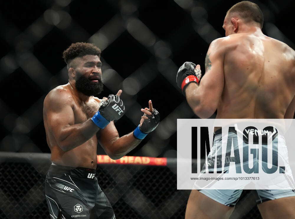 Middle Finger Fight Chris Curtis holds up his middle fingers to Jack Hermansson during ...