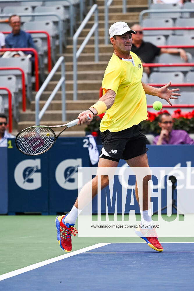 MONTREAL, QC AUGUST 10 Tommy Paul (USA) returns the ball during