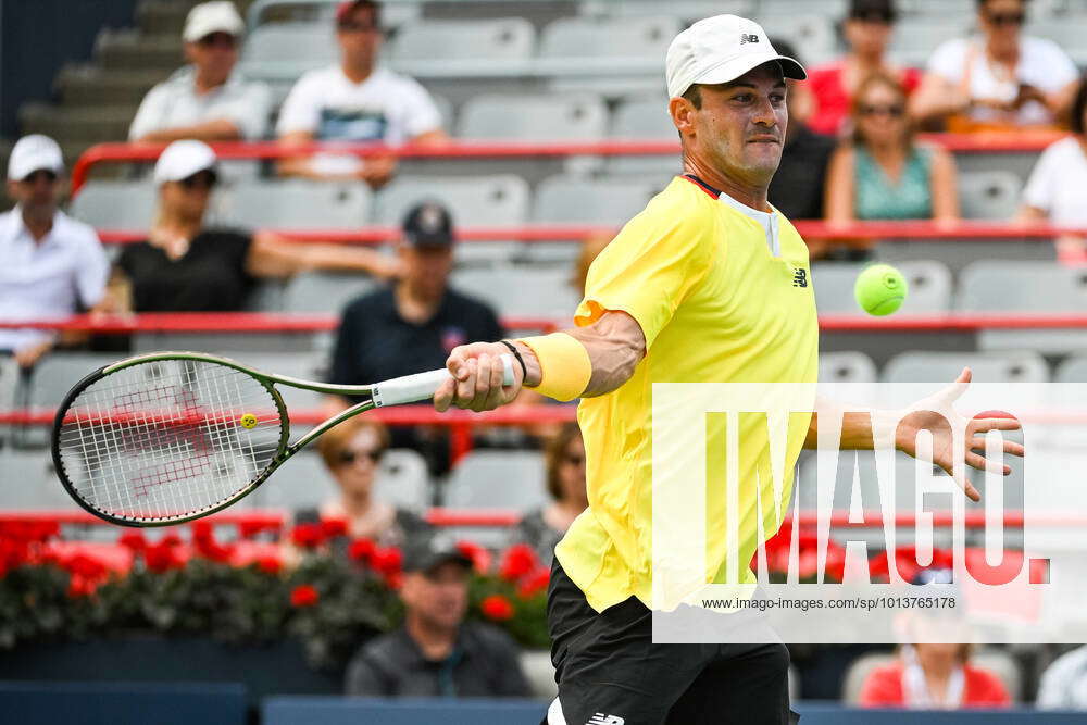 MONTREAL, QC AUGUST 10 Tommy Paul (USA) returns the ball during