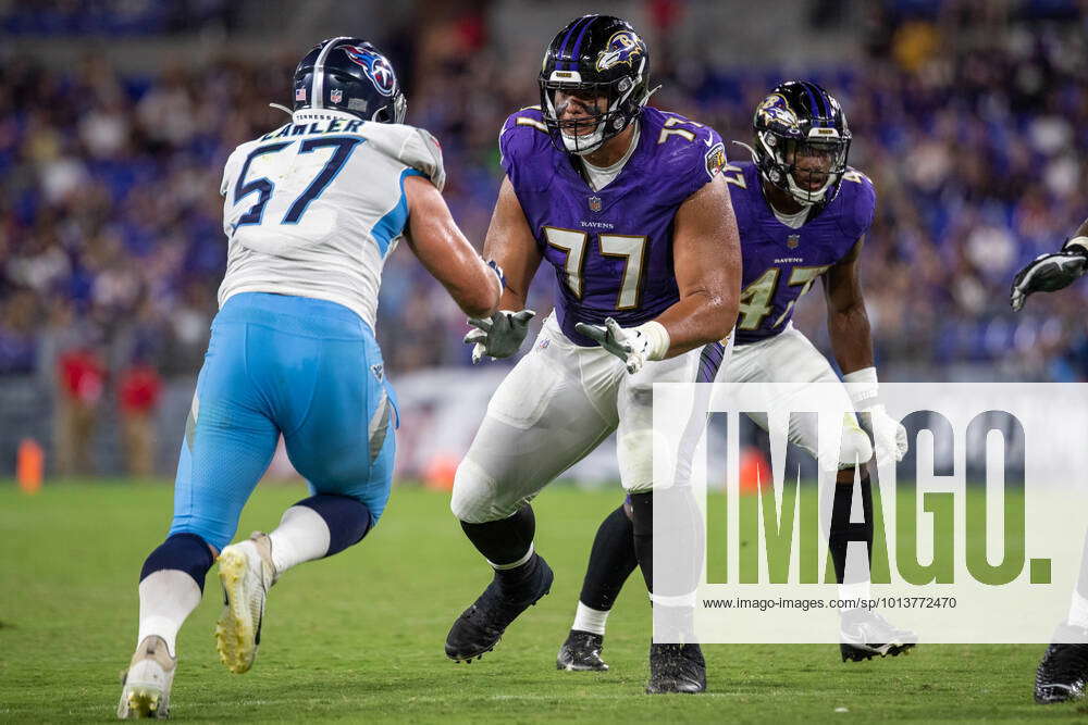 BALTIMORE, MD - AUGUST 11: Baltimore Ravens offensive tackle Daniel Faalele  (77) pass blocks