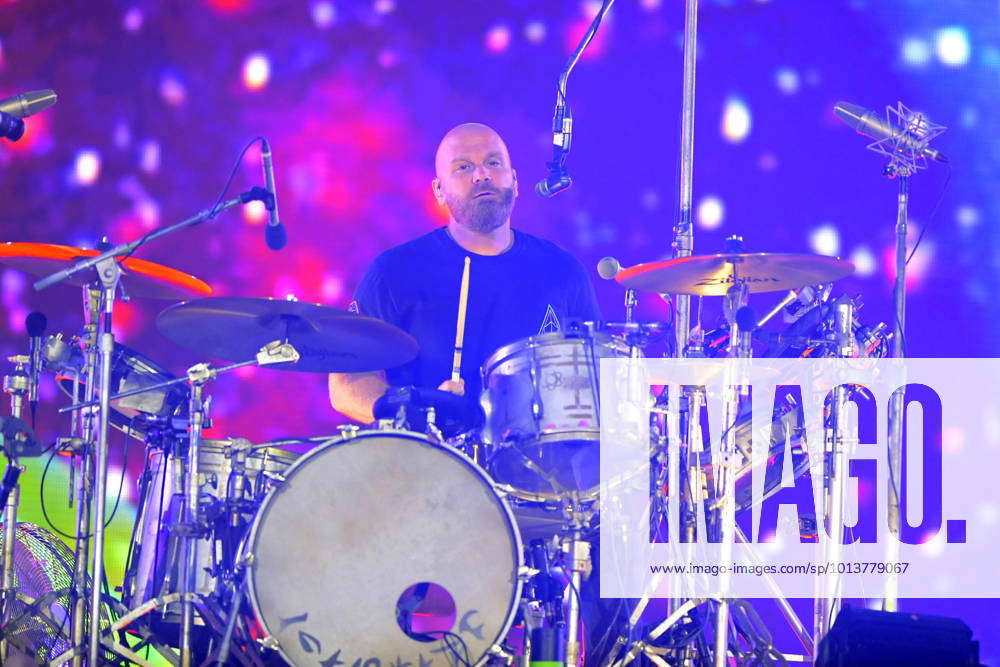 Will Champion of Coldplay performs on stage at Wembley Stadium