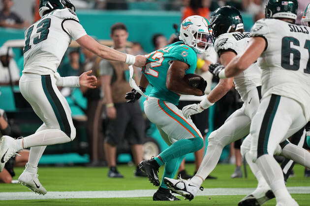 Miami Dolphins safety Elijah Campbell (22) runs during the first half of a  NFL preseason football game against the Miami Dolphins, Saturday, Aug. 27,  2022, in Miami Gardens, Fla. (AP Photo/Lynne Sladky