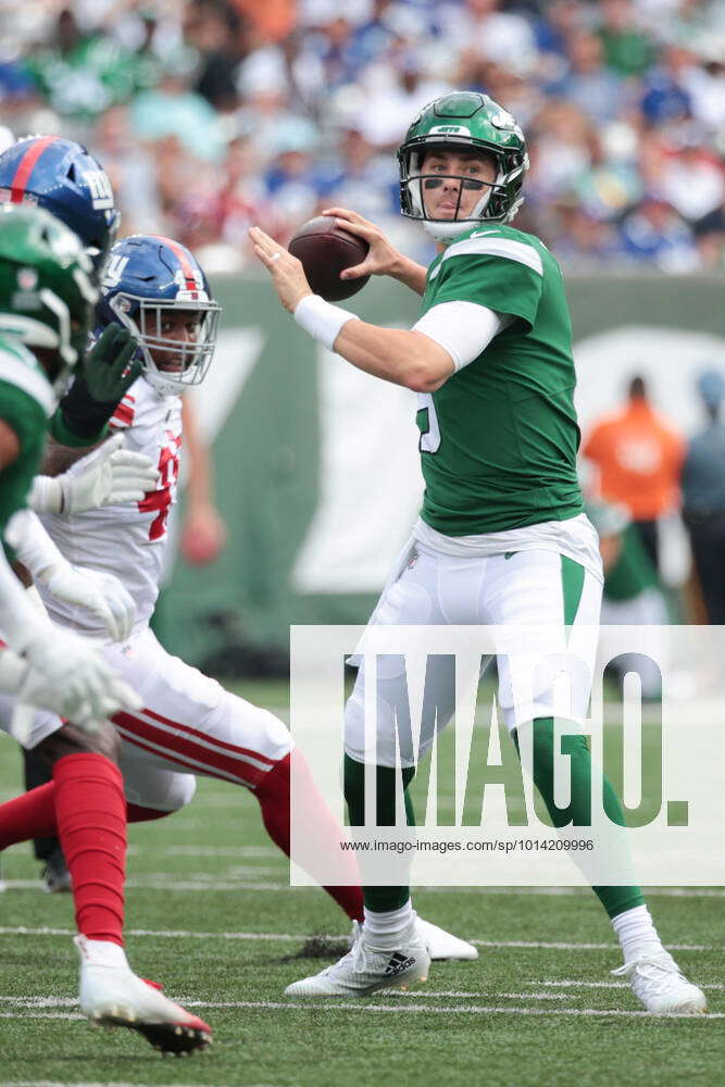 EAST RUTHERFORD, NJ - AUGUST 28: New York Jets quarterback Mike White (5)  throws a pass during