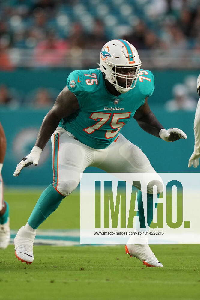 Miami Dolphins offensive tackle Greg Little (75) walks too the