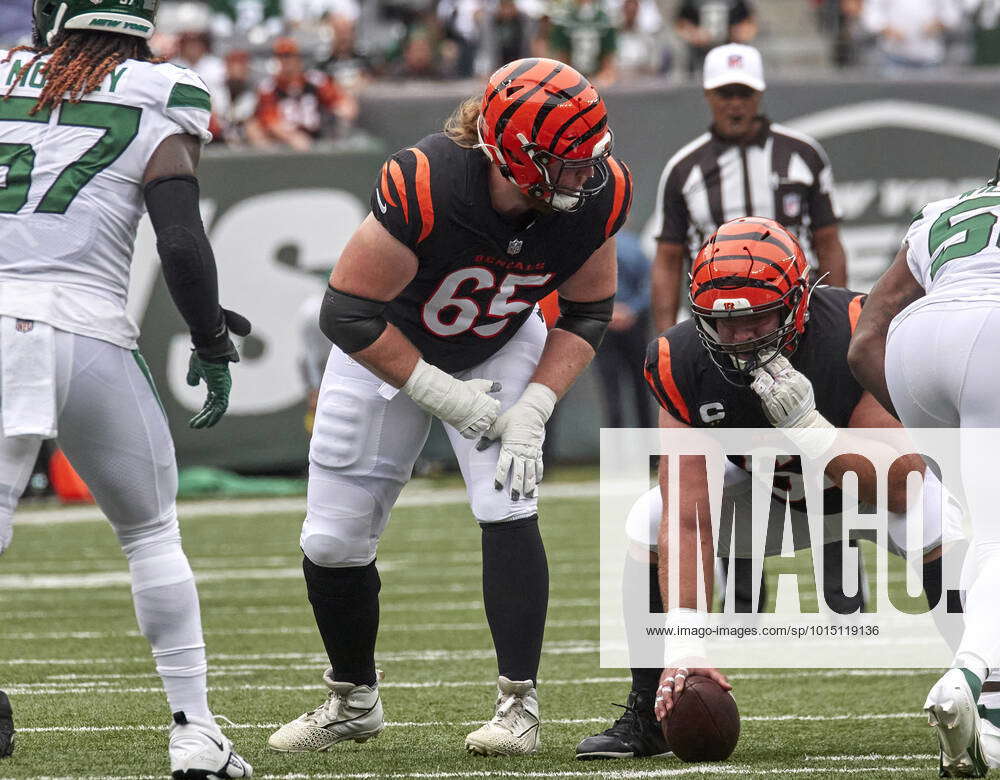 Cincinnati Bengals guard Alex Cappa (65) smiles as he walks off