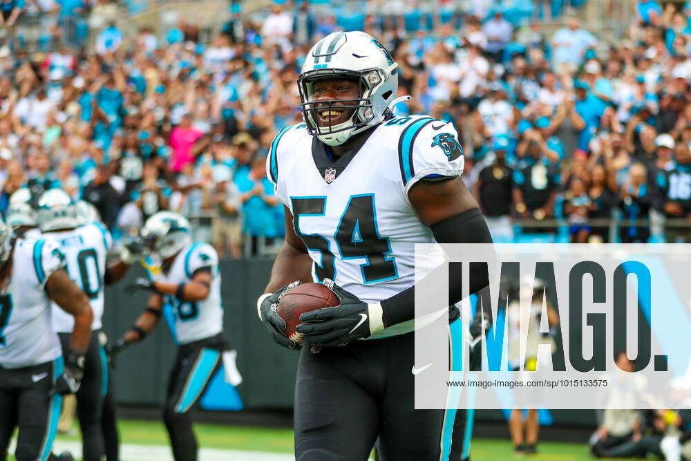 CHARLOTTE, NC - SEPTEMBER 25: Daviyon Nixon (54) of the Carolina Panthers  smiles as he brings the