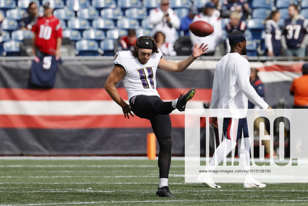 Baltimore Ravens punter Jordan Stout (11) runs off the field at halftime of  an NFL football game against the New England Patriots, Sunday, Sep. 25,  2022, in Foxborough, Mass. (AP Photo/Stew Milne