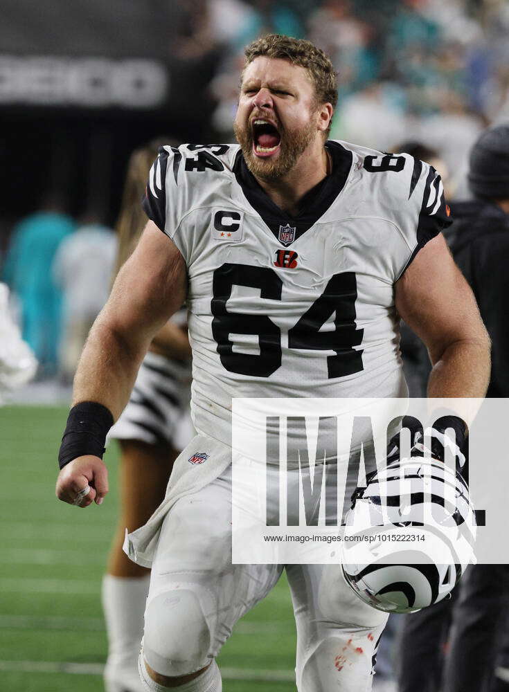 Cincinnati Bengals Ted Karras (64) reacts after defeating the