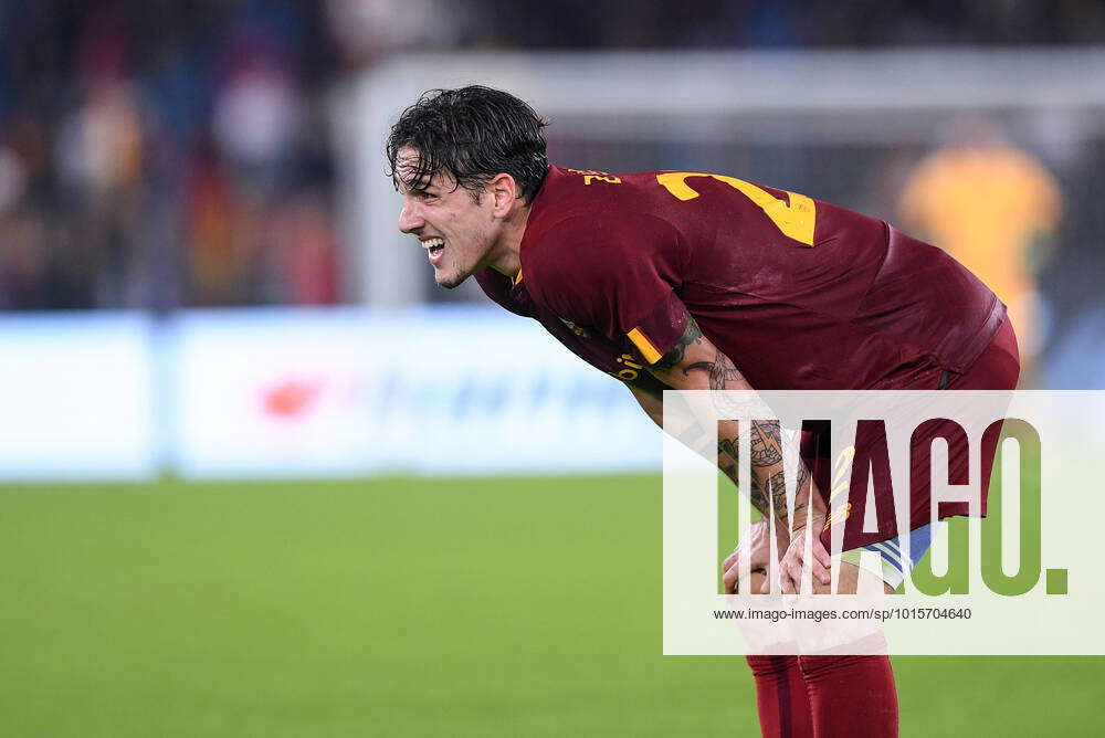 Nicolo' Zaniolo of AS Roma looks dejected receiving a red card