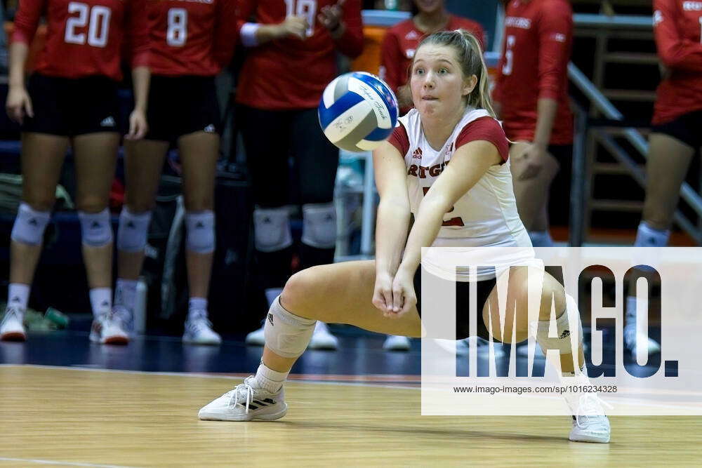 October 12, 2022, Champaign, Illinois, USA: MADYSON CHITTY digs out a ...