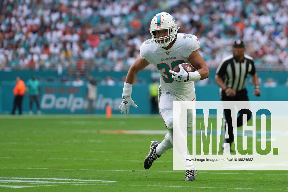 MIAMI GARDENS, FL - NOVEMBER 13: Miami Dolphins fullback Alec Ingold (30)  runs for a touchdown durin