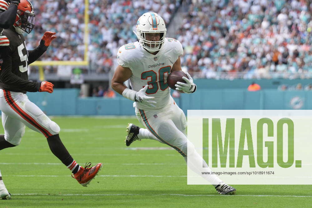 Miami Dolphins fullback Alec Ingold (30) runs for a touchdown during the  first half of an NFL football game against the Cleveland Browns, Sunday,  Nov. 13, 2022, in Miami Gardens, Fla. (AP