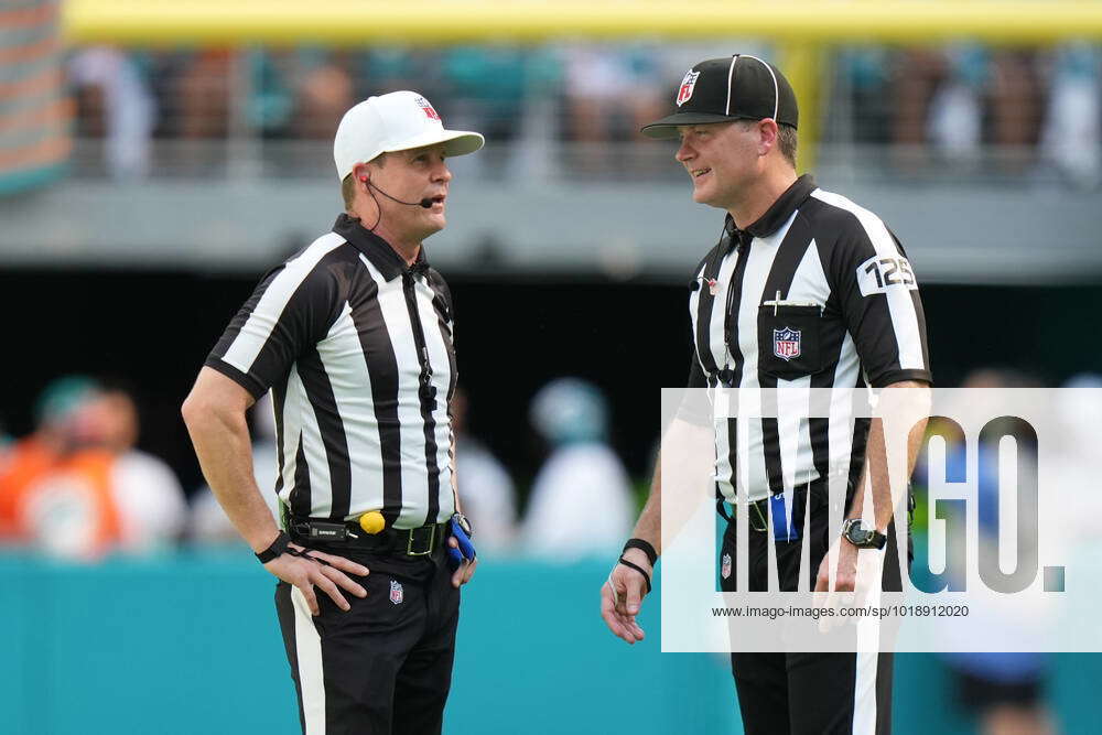 MIAMI GARDENS, FL - NOVEMBER 13: referee Shawn Hochuli (83) chase