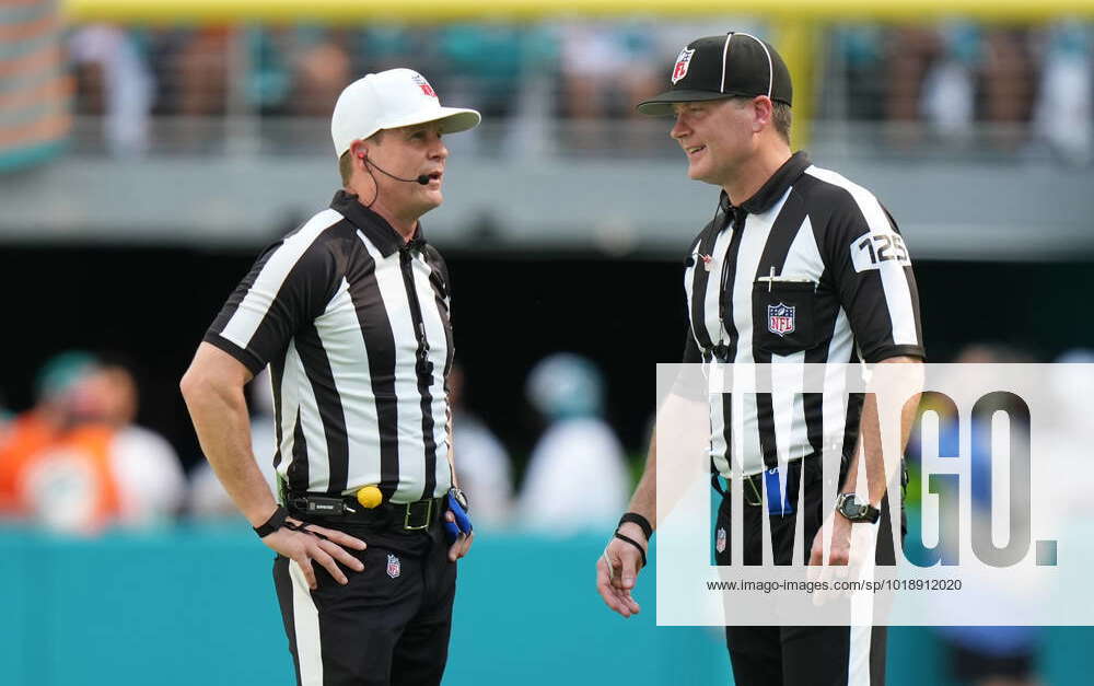 MIAMI GARDENS, FL - NOVEMBER 13: referee Shawn Hochuli (83) chase