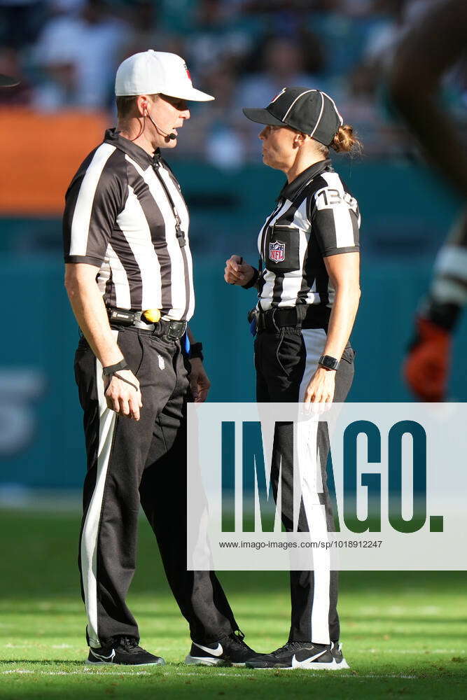 MIAMI GARDENS, FL - NOVEMBER 13: referee Shawn Hochuli (83) chase