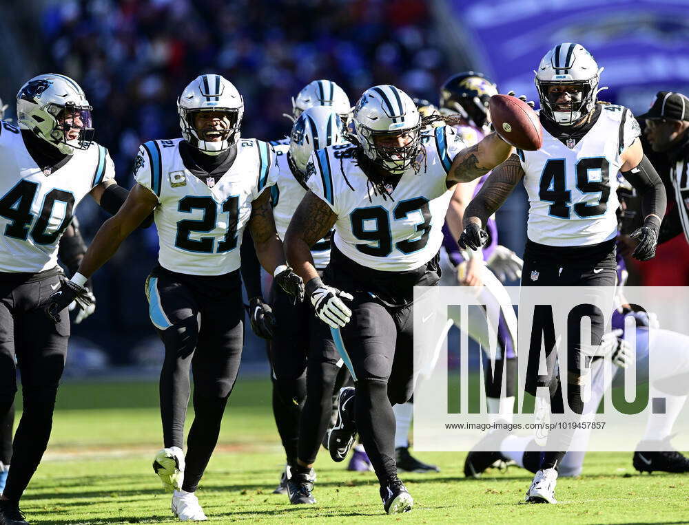 Carolina Panthers defensive tackle Bravvion Roy (93) celebrates after  intercepting a pass from