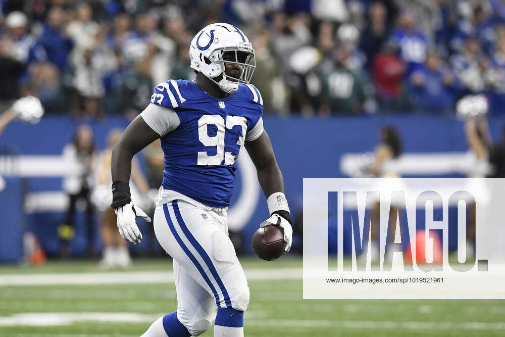 INDIANAPOLIS, IN - NOVEMBER 20: Indianapolis Colts Defensive Tackle Eric  Johnson (93) reacts after r