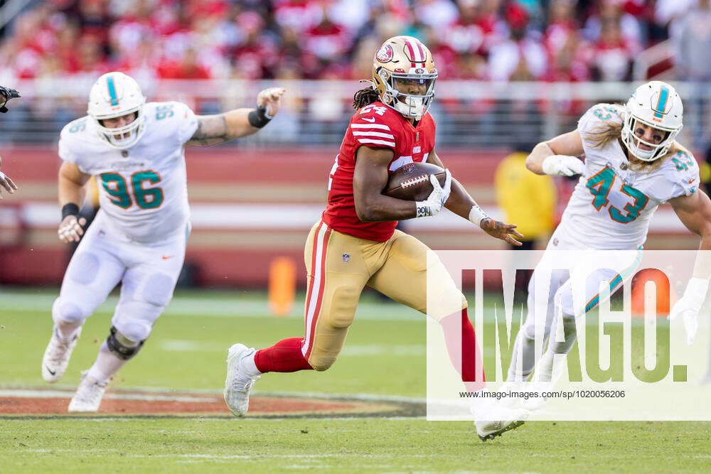 SANTA CLARA, CA - DECEMBER 04: San Francisco 49ers running back Jordan Mason  (24) runs through the