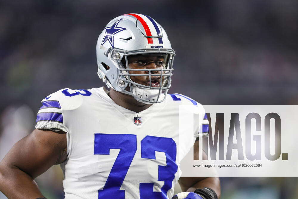 ARLINGTON, TX - DECEMBER 04: Dallas Cowboys offensive tackle Tyler Smith (73)  runs off the field