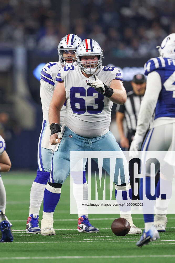 ARLINGTON, TX - DECEMBER 04: Dallas Cowboys center Tyler Biadasz (63) sets  the blocking assignment