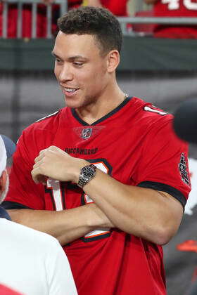 TAMPA, FL - DECEMBER 05: 2022 American League MVP Aaron Judge talks with  friends before the regular season game between the New Orleans Saints and  the Tampa Bay Buccaneers on December 05