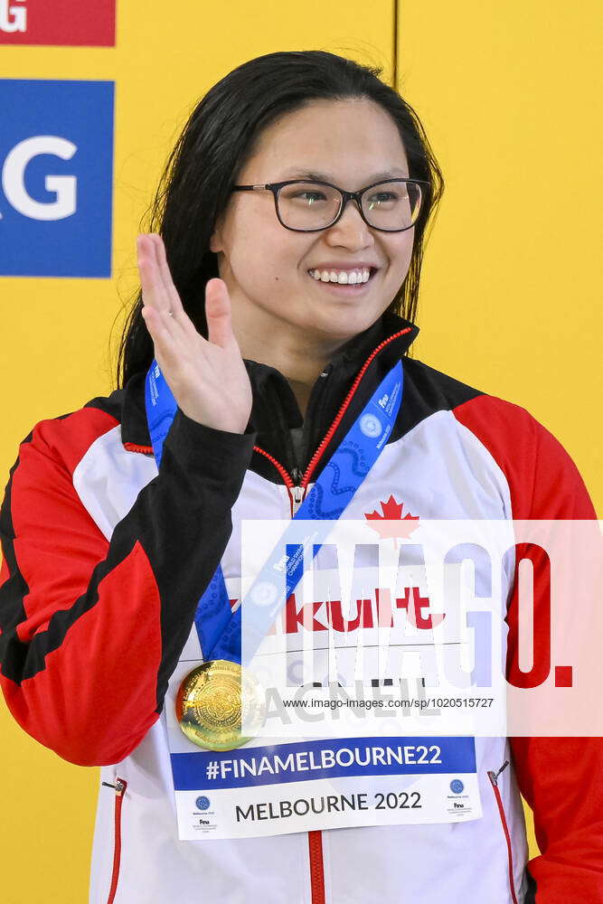 Margaret Macneil of Canada waves after winning the gold medal in the