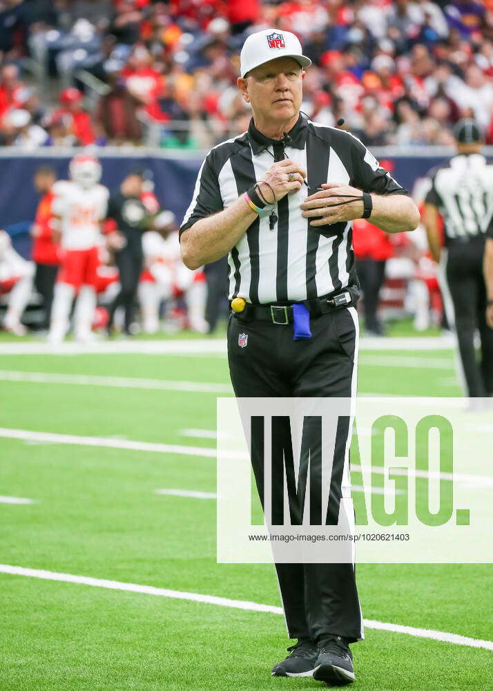 HOUSTON, TX - DECEMBER 18: Referee Carl Cheffers (51) looks toward the  sidelines during the NFL, Ame