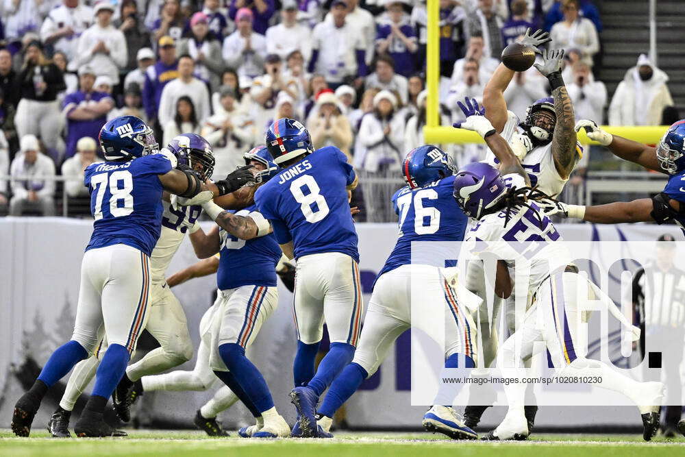 Minnesota Vikings defensive tackle Khyiris Tonga bats down a pass