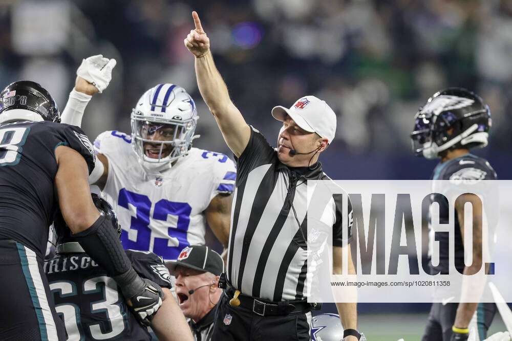 ARLINGTON, TX - DECEMBER 24: A referee signals Dallas Cowboys