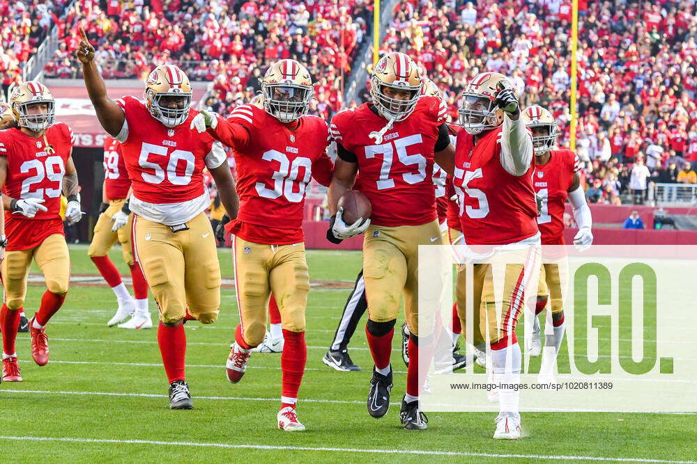 SANTA CLARA, CA - DECEMBER 24: San Francisco 49ers defensive end Jordan  Willis (75) gets escorted in