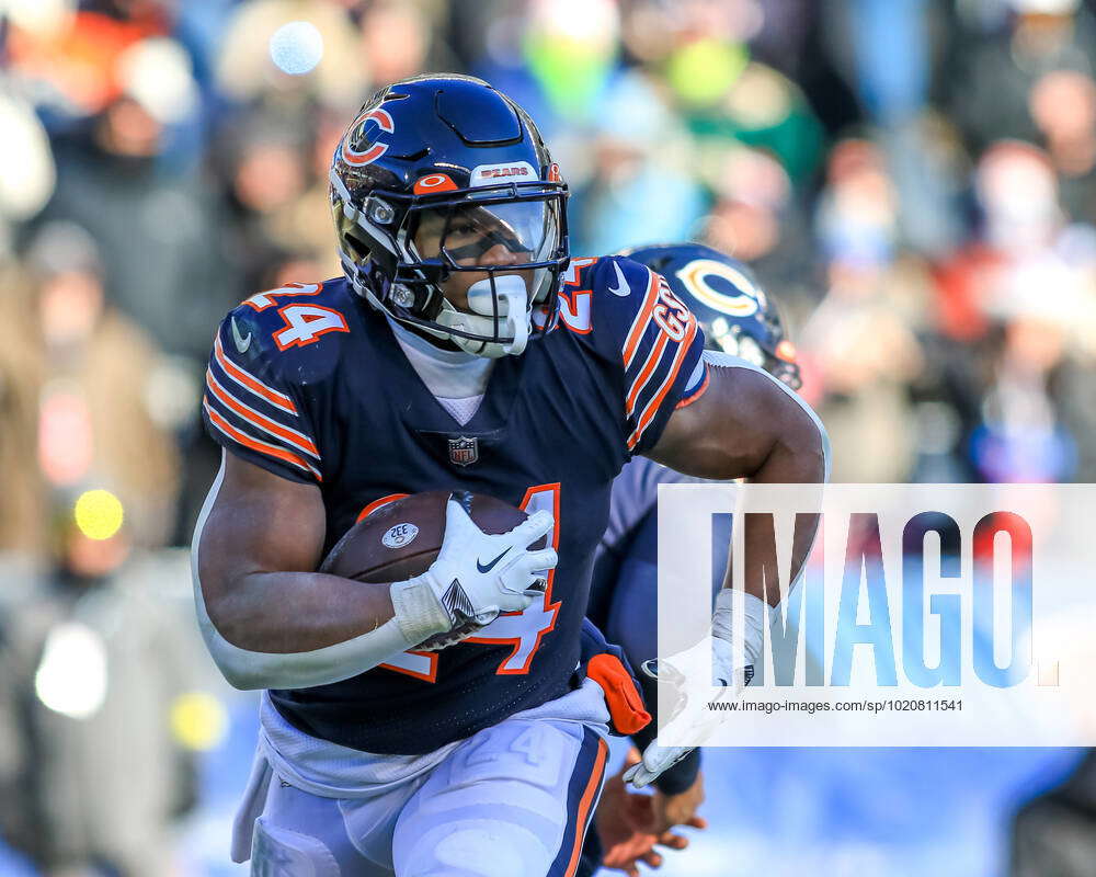 December 24, 2022 - Chicago Bears running back Khalil Herbert (24) takes  off with the ball during NFL football game versus the Buffalo Bills in  Chicago, IL Stock Photo - Alamy