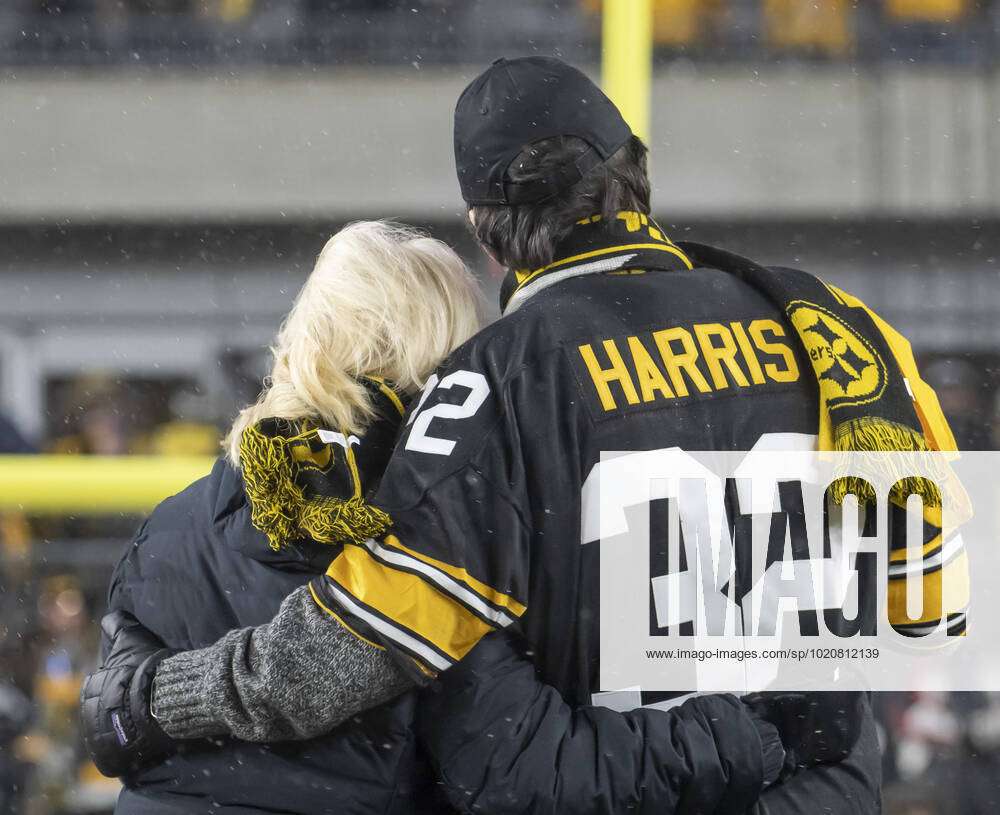 Dana Harris, Widow of Pittsburgh Steelers Franco Harris and son Dok Harris  watches the replay of