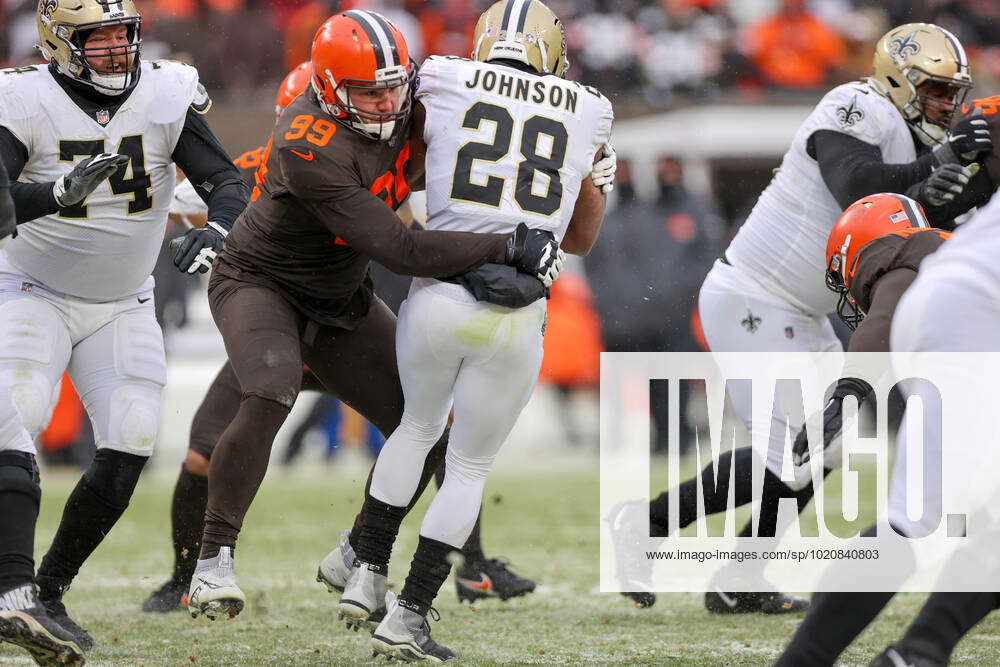 Cleveland Browns defensive tackle Taven Bryan (99) stands on the field  during an NFL football game against the Cincinnati Bengals, Sunday, Dec.  11, 2022, in Cincinnati. Cincinnati won 23-10. (AP Photo/Aaron Doster