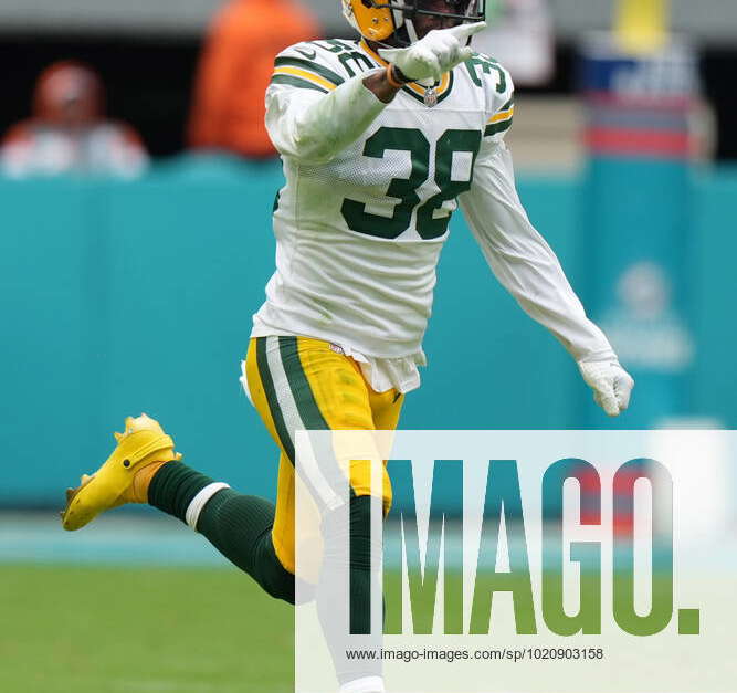 MIAMI GARDENS, FL - DECEMBER 25: Green Bay Packers safety Innis Gaines (38)  directs teammates as he