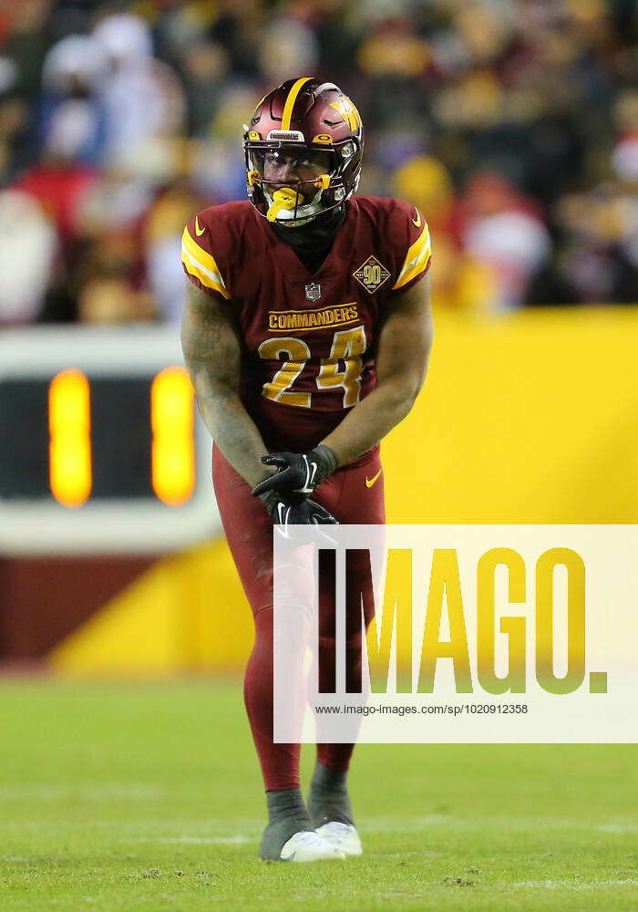 LANDOVER, MD - DECEMBER 18: Washington Commanders running back Antonio  Gibson (24) looks on during t