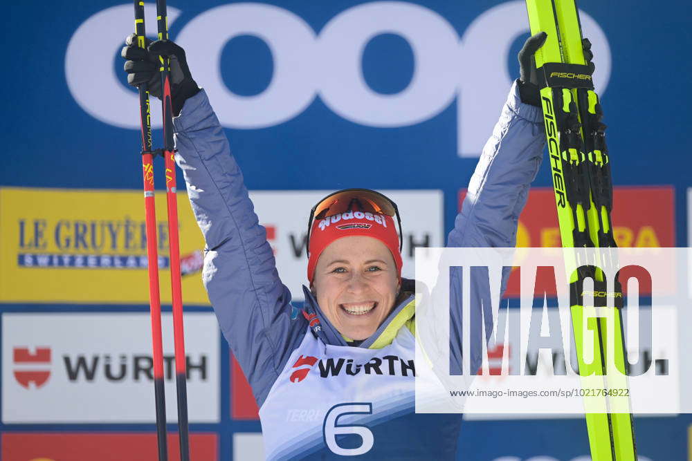 230107 Katharina Hennig of Germany celebrates after finishing first in