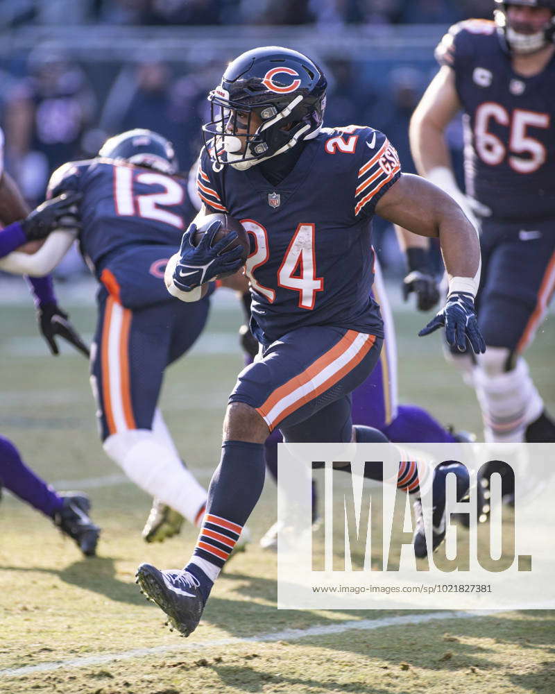 Khalil Herbert of the Chicago Bears runs with the ball during the