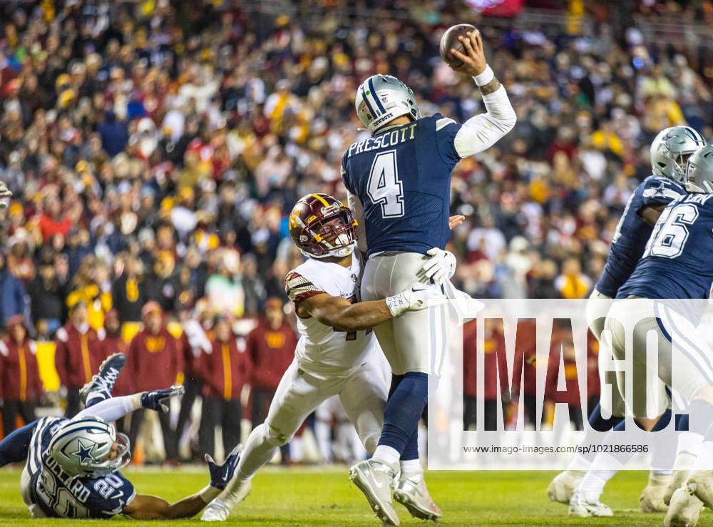 January 8, 2023 : Washington Commanders linebacker Khaleke Hudson (47)  applies pressure to Dallas Cowboys quarterback Dak Prescott (4) during the  game between the Dallas Cowboys and the Washington Commanders in Landover