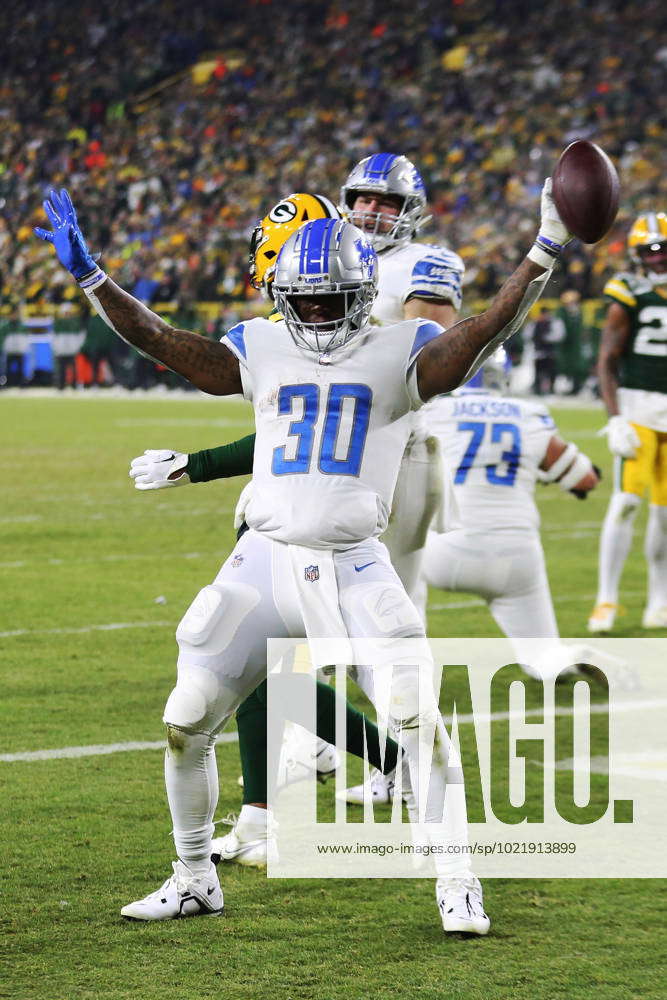 Detroit Lions running back Jamaal Williams (30) celebrates a