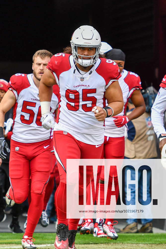 Arizona Cardinals defensive tackle Leki Fotu (95) looks up at a